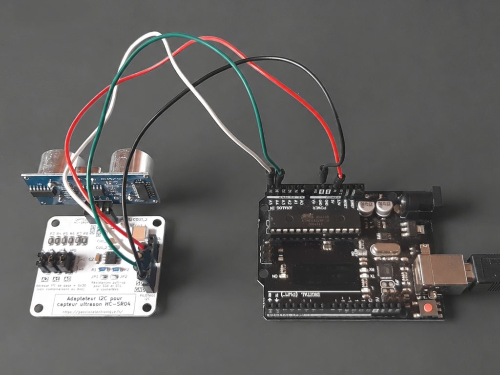 Raccordement carte Arduino Uno sur carte adaptatrice I2C pour breakout board HC-SR04, avec alimentation 5 volts et lignes SDA/SCL pour faire des mesures de distances